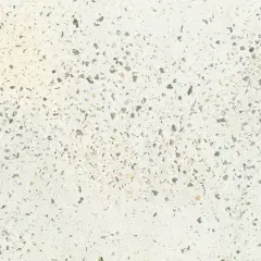 Suelo de terrazo con incrustaciones de piedra gris y beige. ¿Cuánto cuesta pulir un suelo de terrazo?