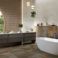 Baño moderno con bañera exenta y lavabo doble. La diferencia entre baldosa y azulejo se aprecia en las paredes, unas lisas y otras con relieve.