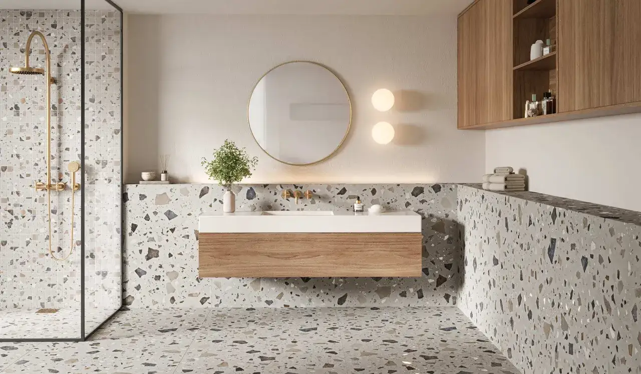 Ba&ntilde;o moderno con ducha, lavabo flotante y azulejos de terrazo. Calcula el precio alicatar ba&ntilde;o para este dise&ntilde;o.